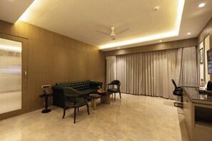 Family Double Room, Balcony, Garden View | In-room safe, desk, laptop workspace, iron/ironing board