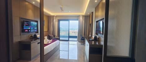 Premium Double Room, Balcony, Garden View | In-room safe, desk, laptop workspace, iron/ironing board