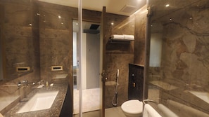 Shower, slippers, towels, soap