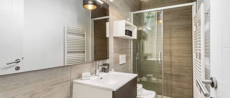 Standard Apartment, Multiple Bedrooms (Secret Of Lugano With Lake View) | Bathroom | Shower, hair dryer, towels, soap