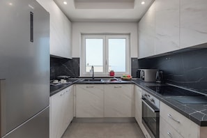 Standard Apartment, 2 Bedrooms (Seaview Apartment Kostrena Two) | Private kitchen | Fridge, microwave, oven, stovetop