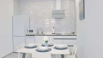 Fridge, microwave, dishwasher, cookware/dishes/utensils