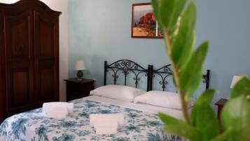 Classic Triple Room, Courtyard View | Desk, laptop workspace, free WiFi