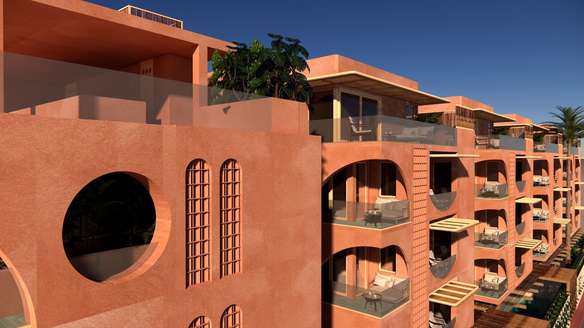 A multi-story hotel with balconies, large windows, and outdoor seating areas.