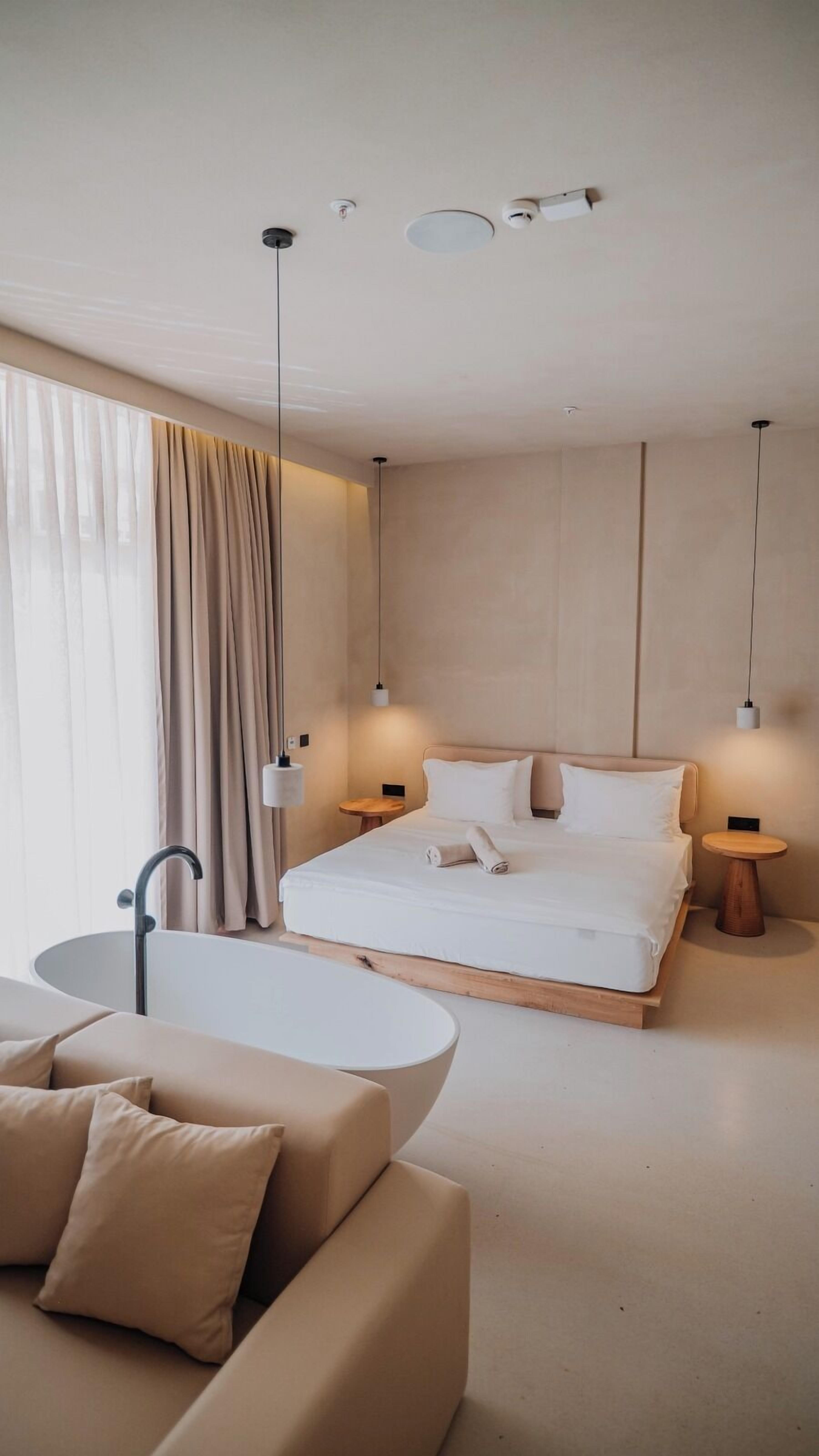 Deluxe Room, Pool View | In-room safe, blackout drapes, free WiFi