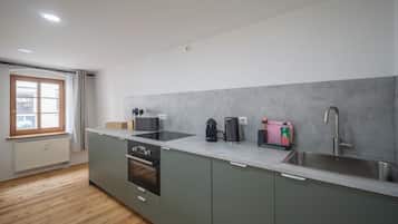 Comfort Condo | Private kitchen | Full-sized fridge, microwave, oven, stovetop