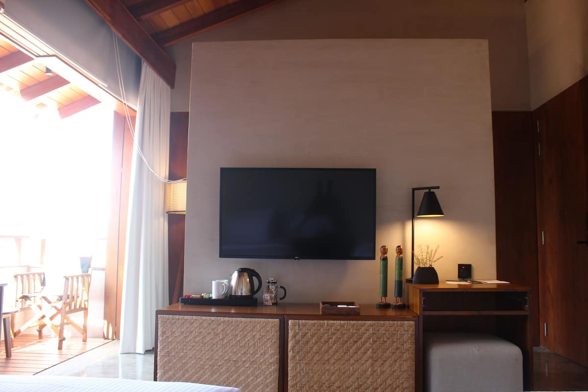 Standard Double Room, Balcony, Partial Sea View | In-room safe, desk, laptop workspace, iron/ironing board