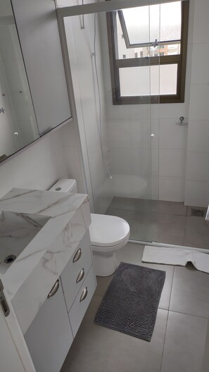 Hair dryer, towels, soap, toilet paper