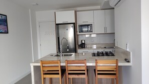 Microwave, oven, stovetop, coffee/tea maker