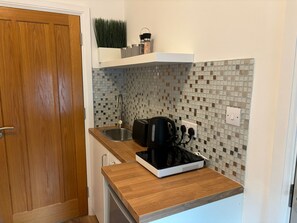 Microondas y placa de cocina