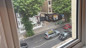 A street view with a building labeled 'Saba' and 'Marsh & Parsons'. - compact studio in central location with excellent transport links. (London)