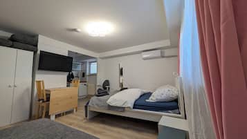 1 chambre, fer et planche Ă  repasser, Wi-Fi, draps fournis