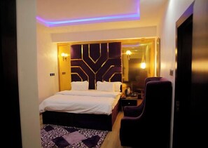 Economy Room, Balcony, City View | Desk, laptop workspace, blackout drapes, soundproofing