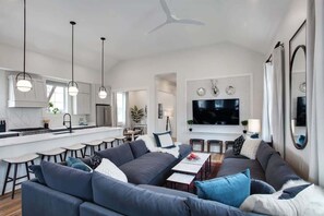 Una televisión, libros, una oficina