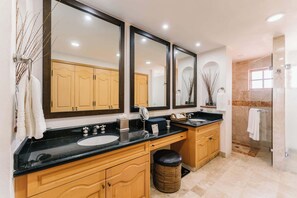 Shower, hair dryer, towels, shampoo