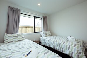 4 bedrooms, desk, iron/ironing board, travel cot