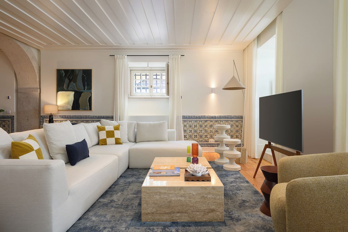 Superior Apartment | Living area | 50-inch flat-screen TV with cable channels