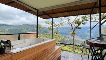 Habitación Deluxe, vista al parque | Área de sala de estar