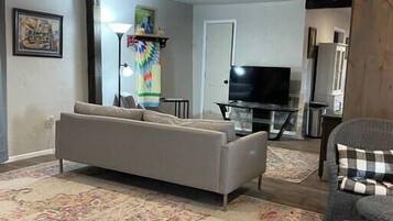 TV, fireplace, books, offices