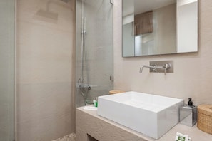 Exclusive Apartment, Mountain View | Bathroom | Shower, rainfall showerhead, eco-friendly toiletries, hair dryer