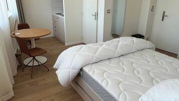 1 bedroom, laptop workspace, iron/ironing board, bed sheets