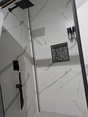 Hair dryer, towels, soap, shampoo