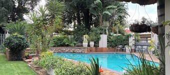 Spacious 4-bedroom luxurious house in upmarket suburb of Krugersdorp.