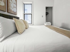 4 bedrooms, iron/ironing board, travel crib, bed sheets