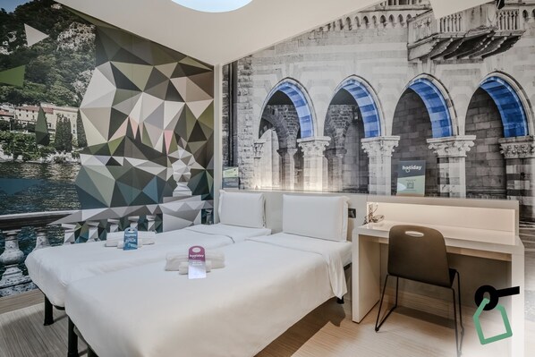 Habitación doble económica | Cunas, wifi gratis y ropa de cama 