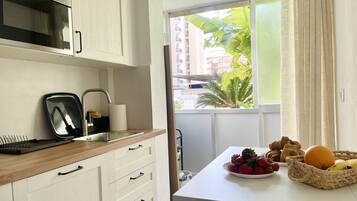 Fridge, microwave, dishwasher, coffee/tea maker