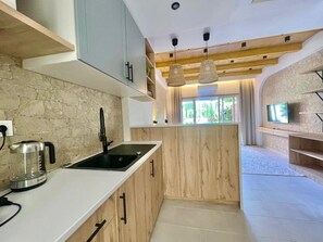 Fridge, microwave, coffee/tea maker, toaster