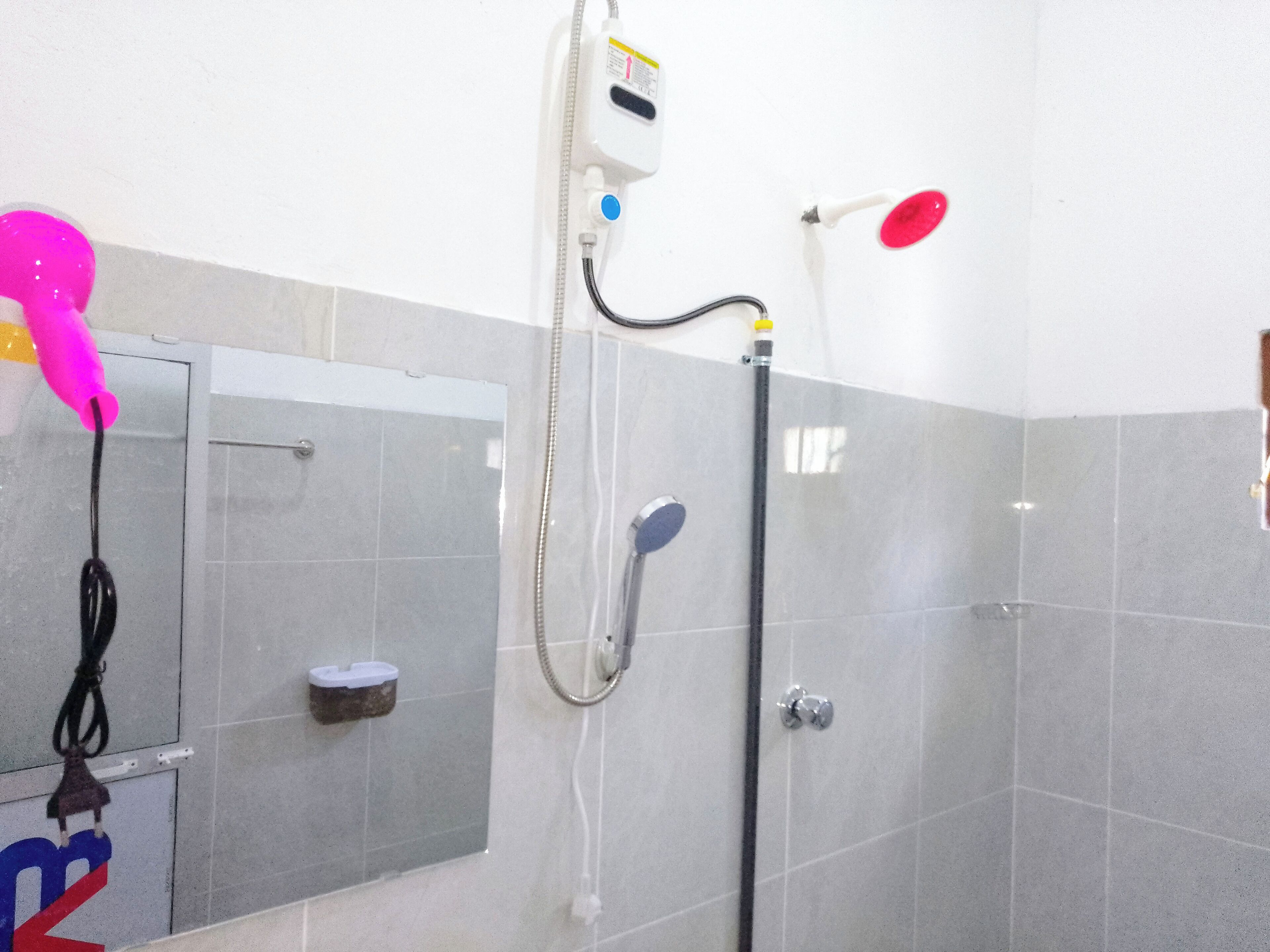 Standard Double Room | Bathroom | Shower, hair dryer, towels, soap