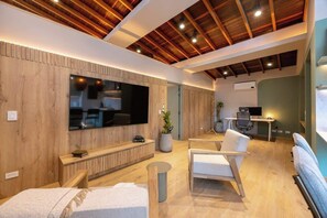 TV, offices - Digital Nomad Paradise 1BR Luxury & Peace with A/C (Medellín)