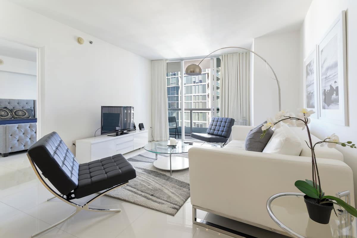 Premium Apartment | Living room | 150-inch Smart TV with satellite channels, Netflix, streaming services