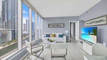 Royal Apartment, Sea View | Living area | 150-inch Smart TV with satellite channels, Netflix, streaming services