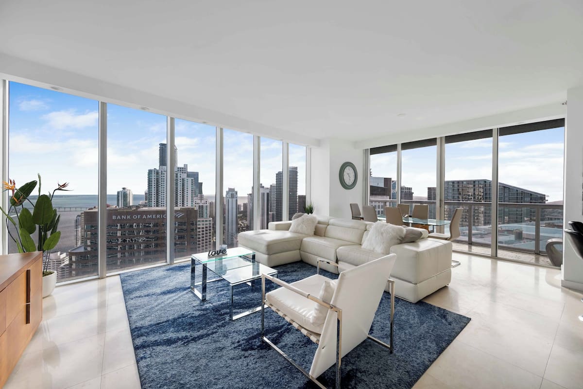 Luxury Apartment | Living area | 150-inch Smart TV with satellite channels, Netflix, streaming services
