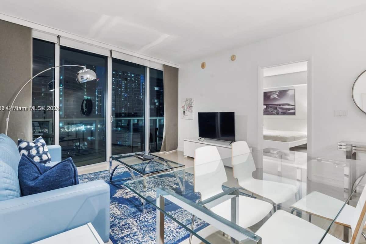 Premier Apartment | Living area | 150-inch Smart TV with satellite channels, Netflix, streaming services