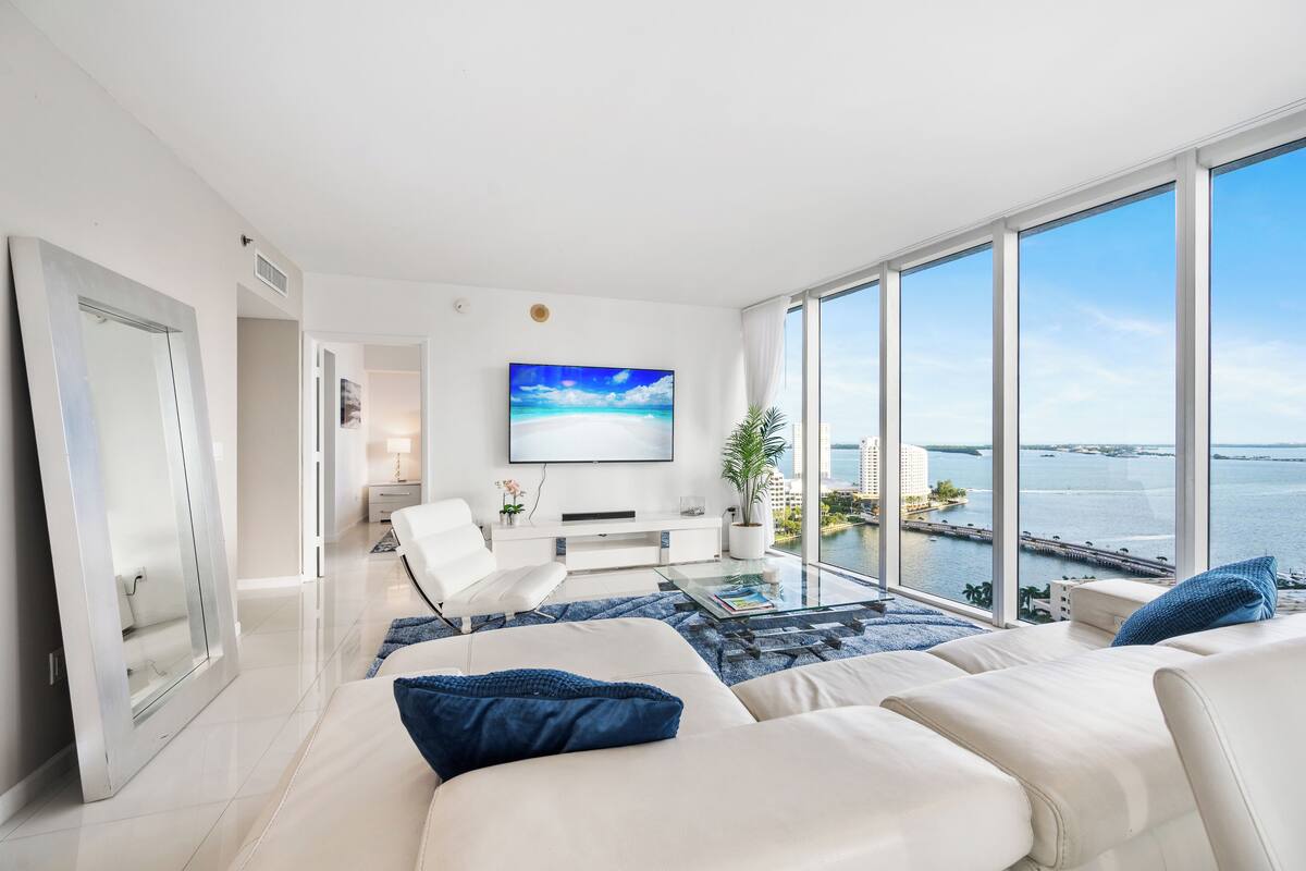 Luxury Apartment | Living area | 150-inch Smart TV with satellite channels, Netflix, streaming services