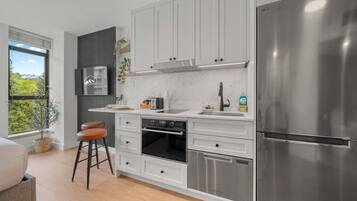 Fridge, toaster, cookware/dishes/utensils