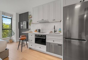 Fridge, toaster, cookware/dishes/utensils