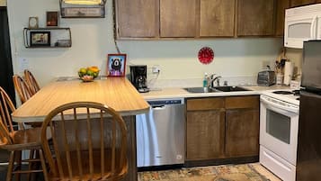 Condo | Private kitchen | Full-size fridge, microwave, oven, stovetop