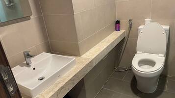 Apartment, City View | Bathroom | Slippers