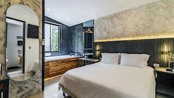 Deluxe Apartment | Peralatan tempat tidur premium, gebar bulu kapas, tilam berlapik