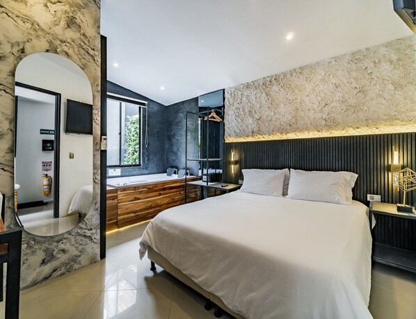 Deluxe Apartment | Premium bedding, down comforters, pillowtop beds, minibar - ONE APARTMENTS LLERAS (Medellín)