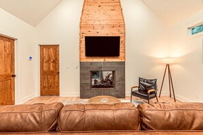 Smart TV, fireplace, books
