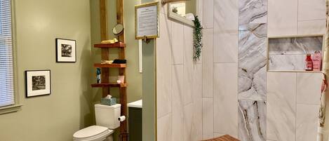 Shower, hair dryer, towels, soap