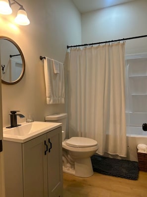 Hair dryer, towels, soap, shampoo