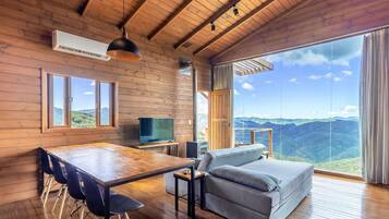 Basic Chalet | Living area | 32-inch TV with digital channels
