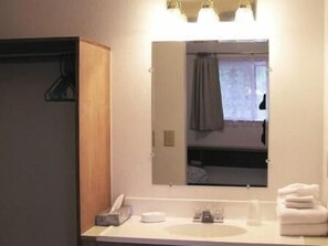 Combined shower/bathtub, hair dryer, towels, soap