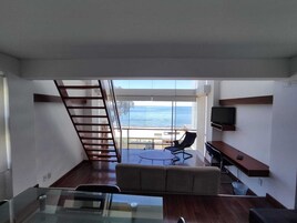 Deluxe Studio, Balcony, Lake View | Living area | TV